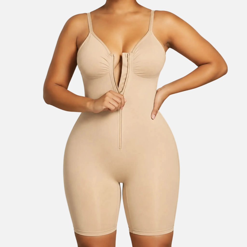 Beige shapewear bodysuit worn by a model on a white background